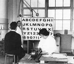 In the D & P studio: Ladislas Mandel (standing) draws the expanded version, being examined by Adrian Frutiger (seated). Lucette Girard is cutting preparatory letters
